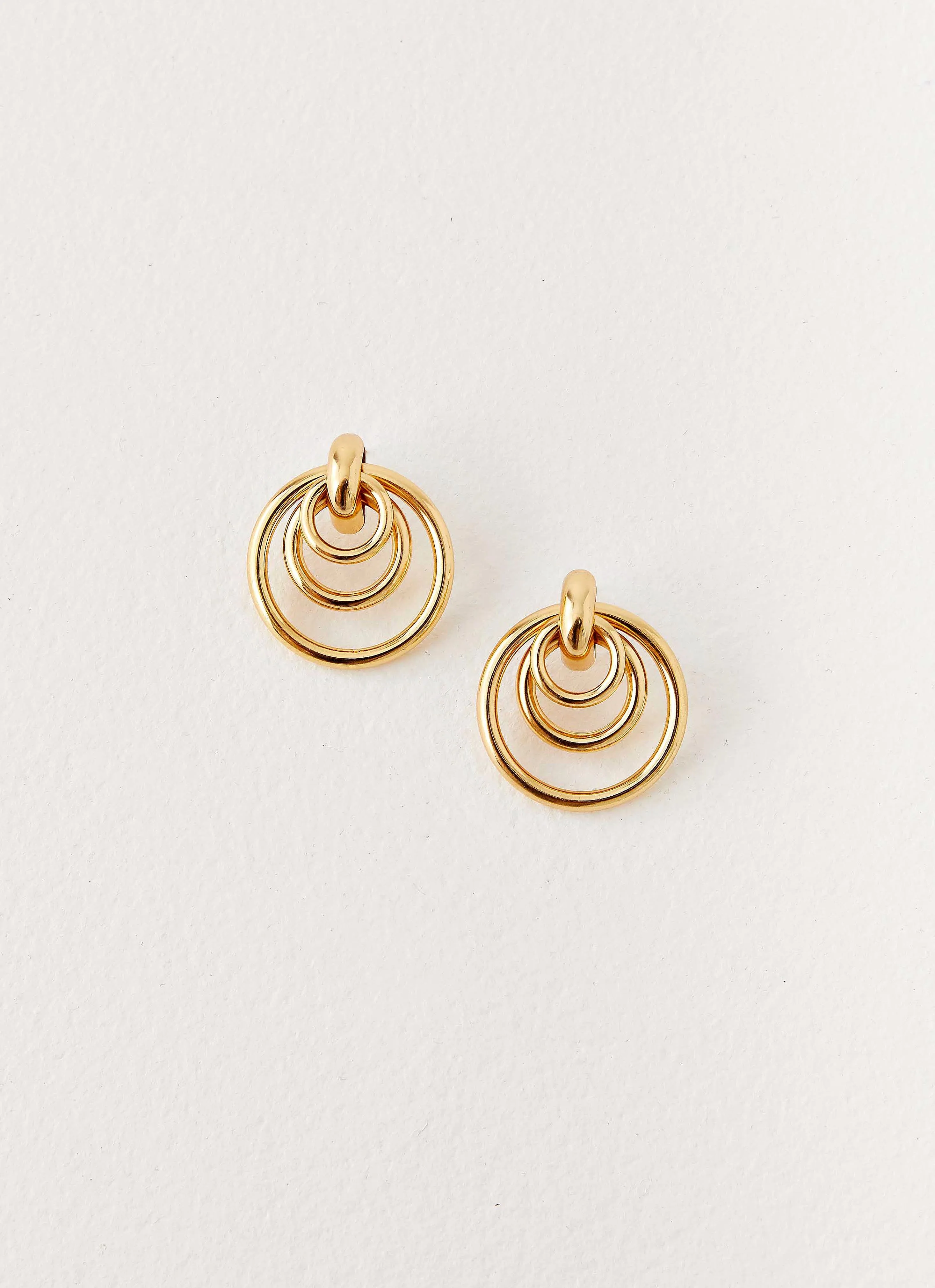 Cosmic Earrings - Gold sold by Peppermayo