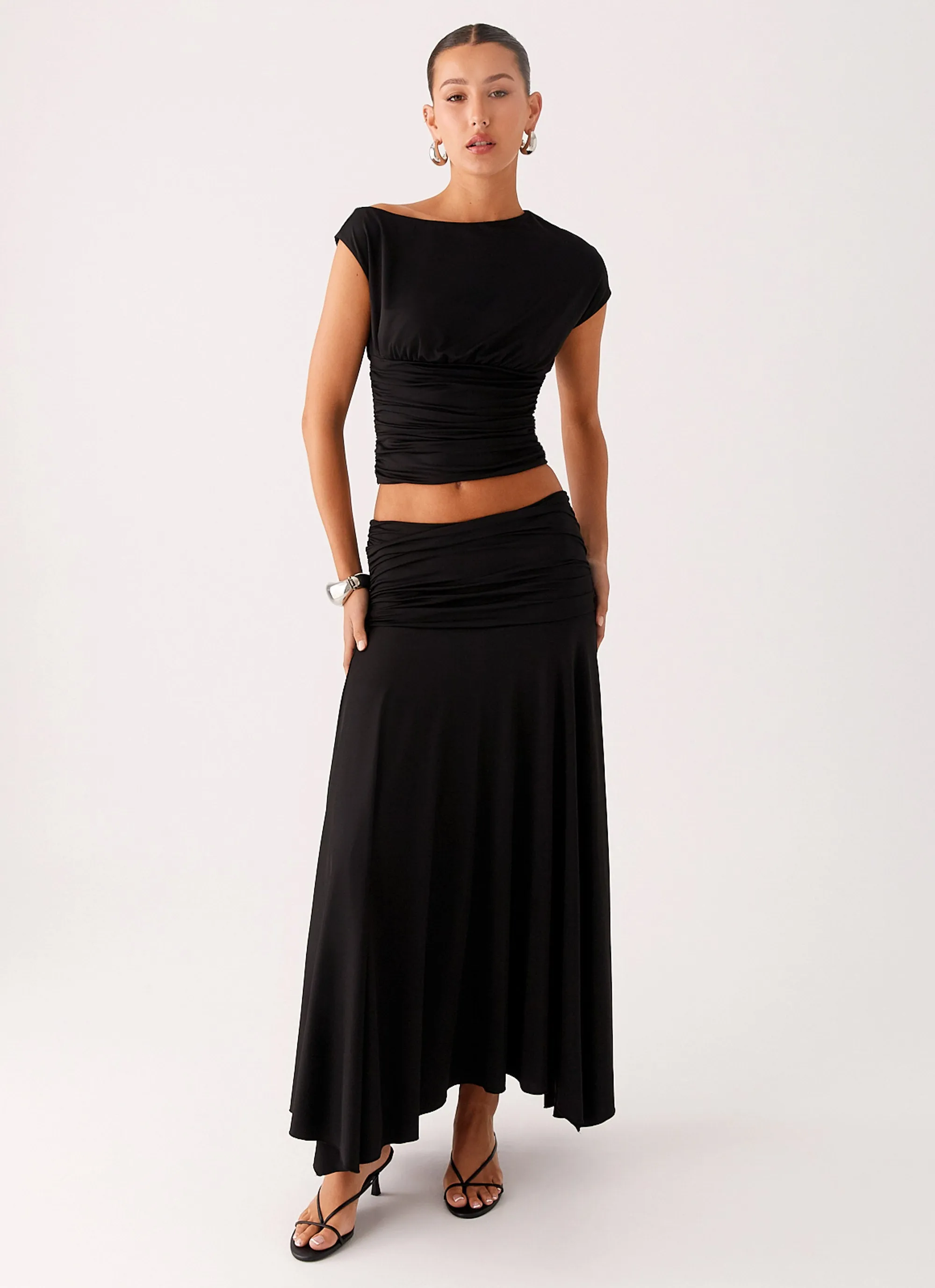 Liana Ruched Maxi Skirt - Black sold by Peppermayo