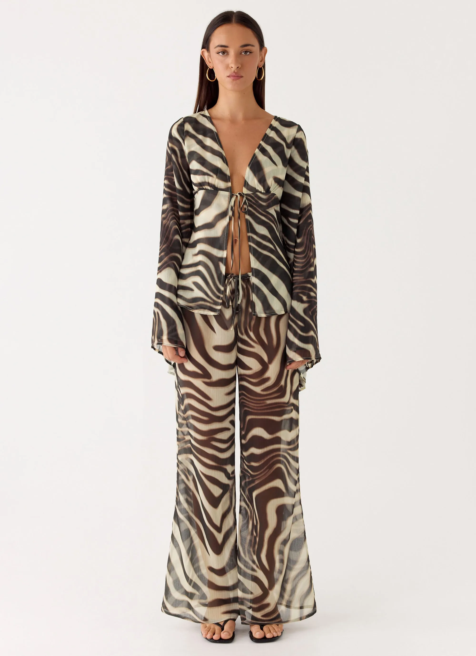 Jadia Flared Pants - Zebra sold by Peppermayo