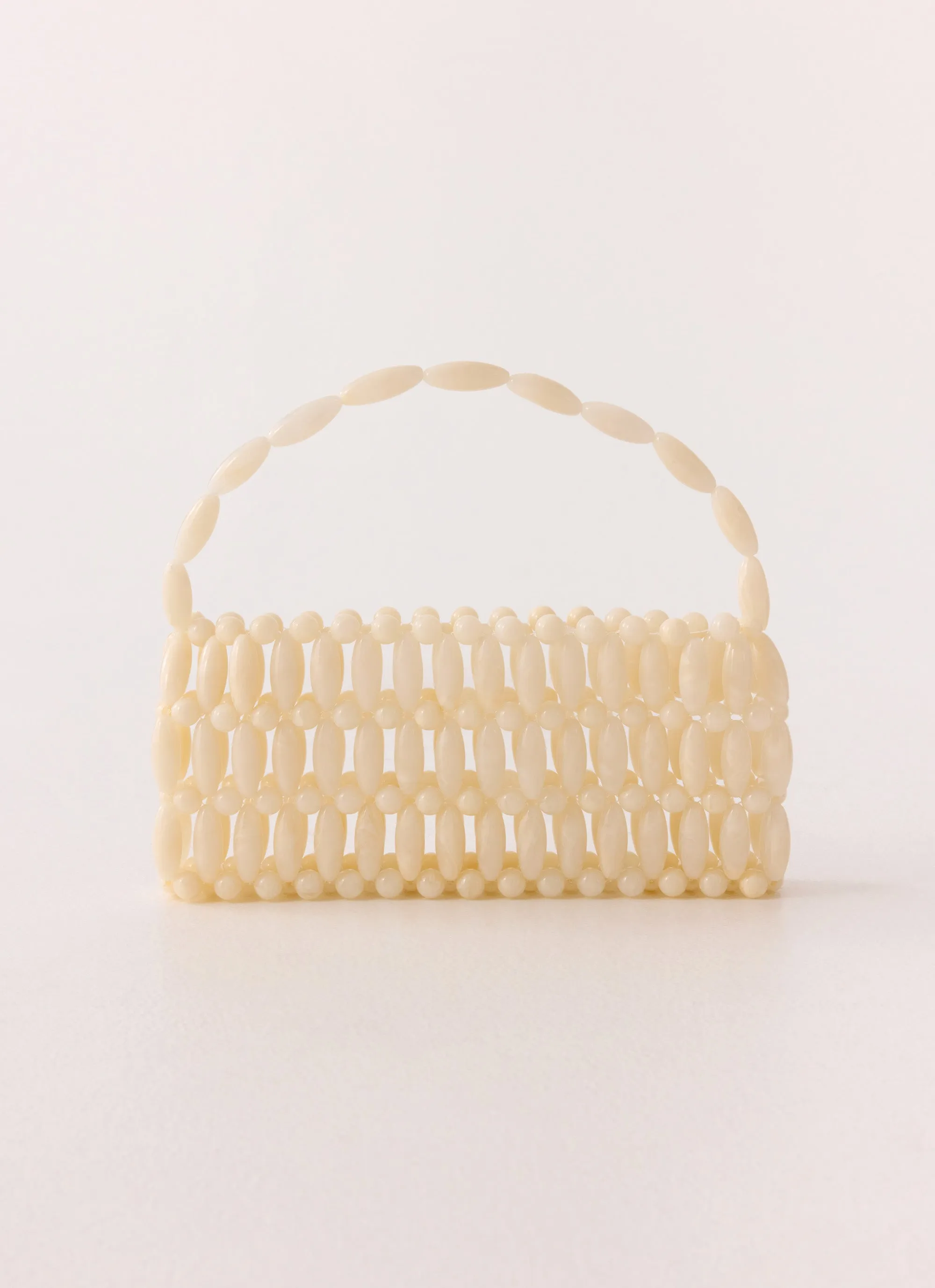 Radiant Line Bag - Ivory sold by Peppermayo