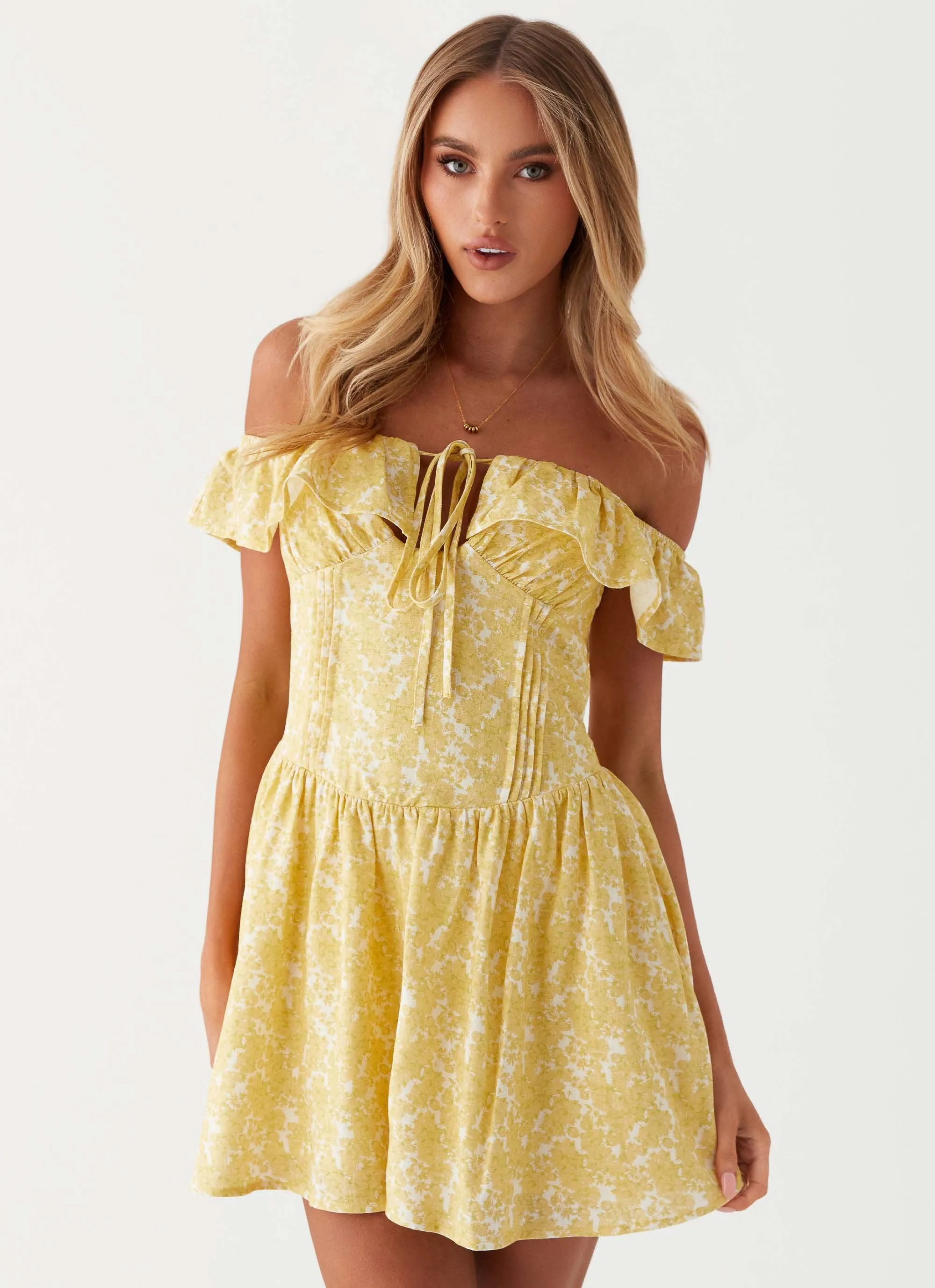 Tarryn Mini Dress - Yellow Floral sold by Peppermayo