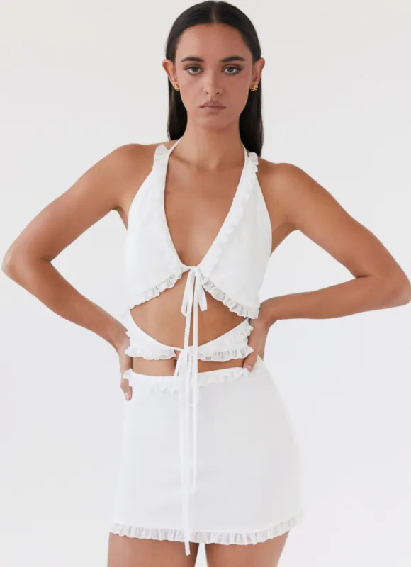 Love Exchange Ruffle Mini Dress - White sold by Peppermayo