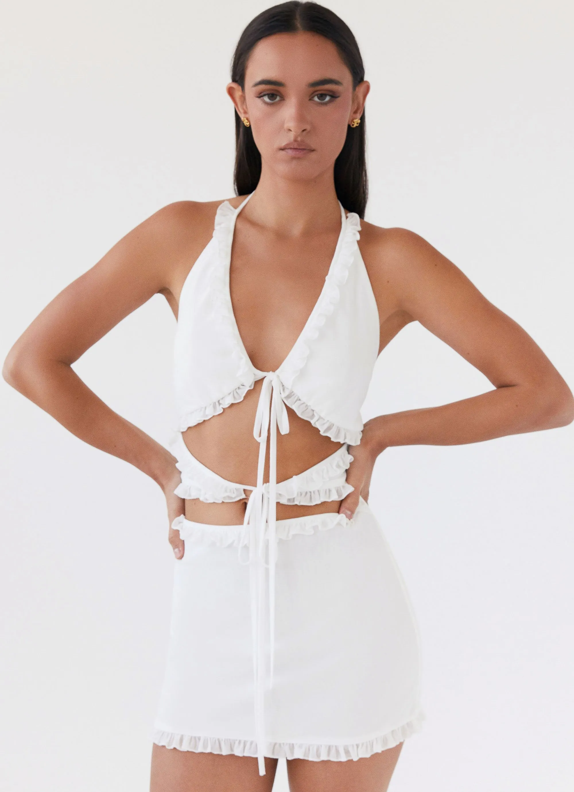 Love Exchange Ruffle Mini Dress - White sold by Peppermayo