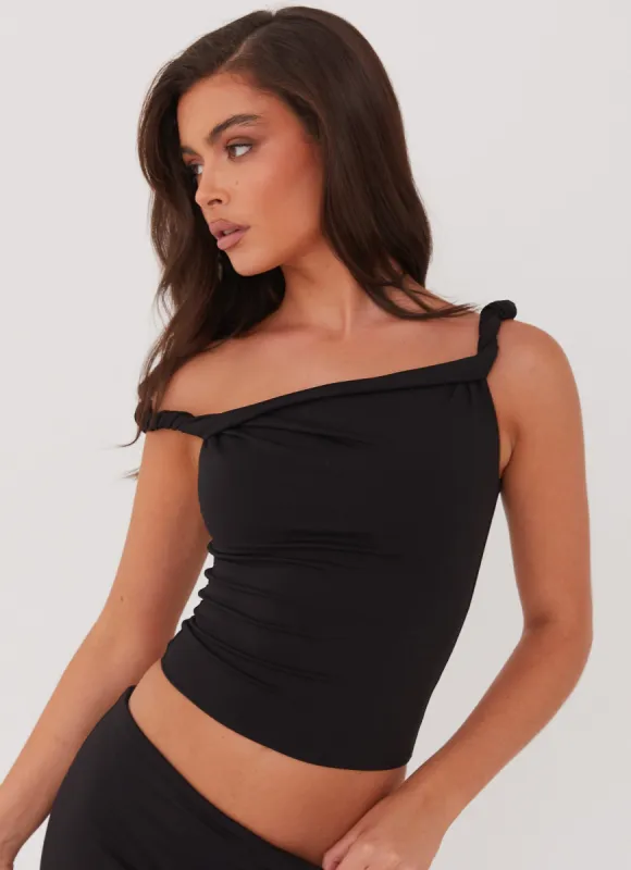 Solace Soul Twist Shoulder Top - Black sold by Peppermayo