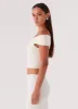 Trixie Twist Off Shoulder Top - Ivory sold by Peppermayo