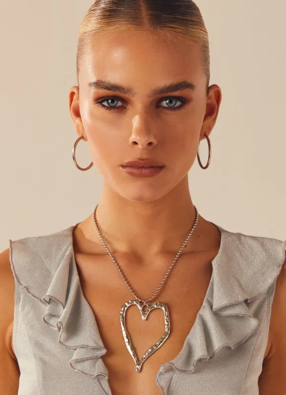 Love Sick Necklace - Silver sold by Peppermayo