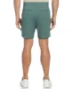 Stretch Solid Tech Short sold by Perry Ellis