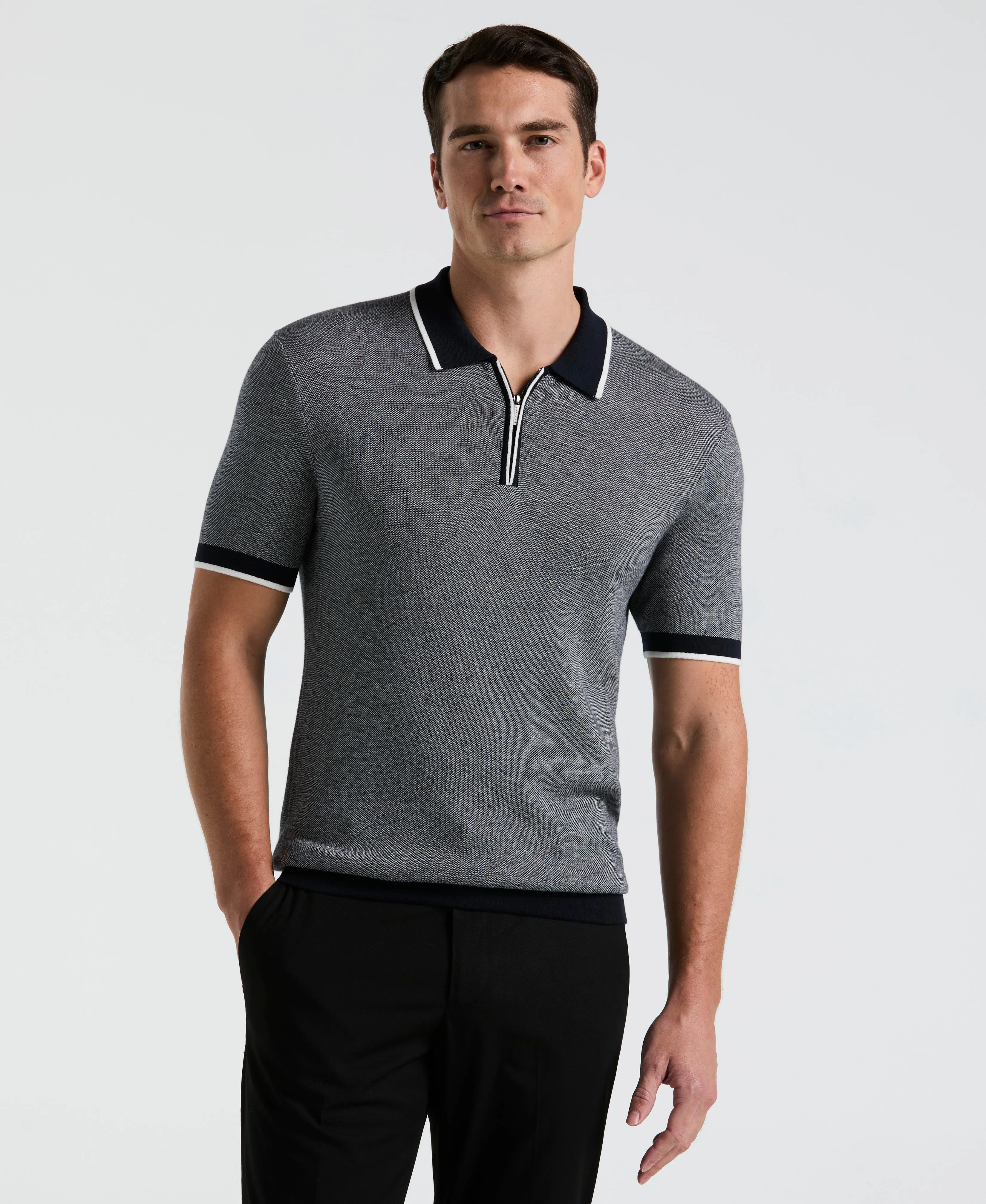 Bi-Color Stitch Zip Polo sold by Perry Ellis