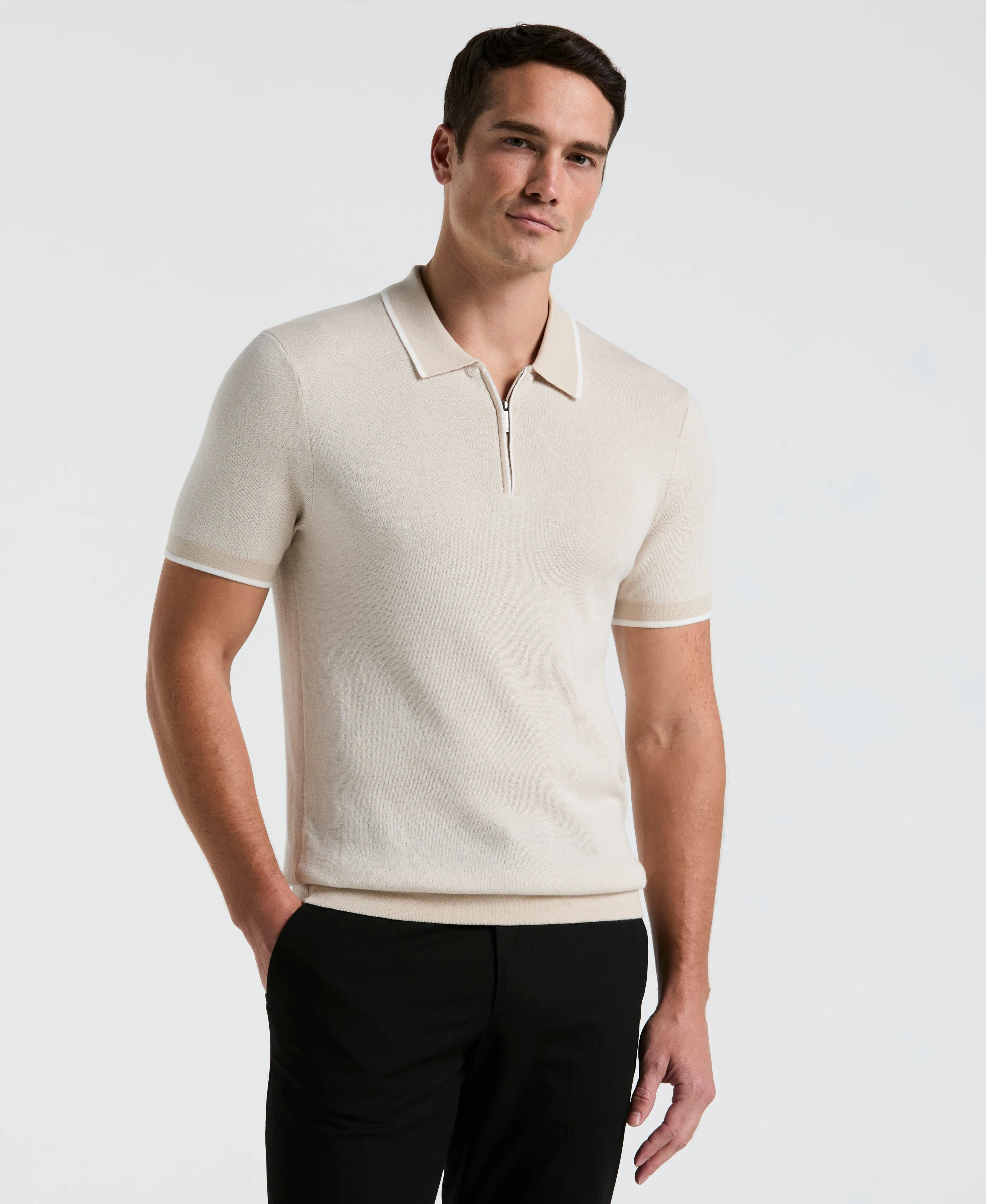 Bi-Color Stitch Zip Polo sold by Perry Ellis