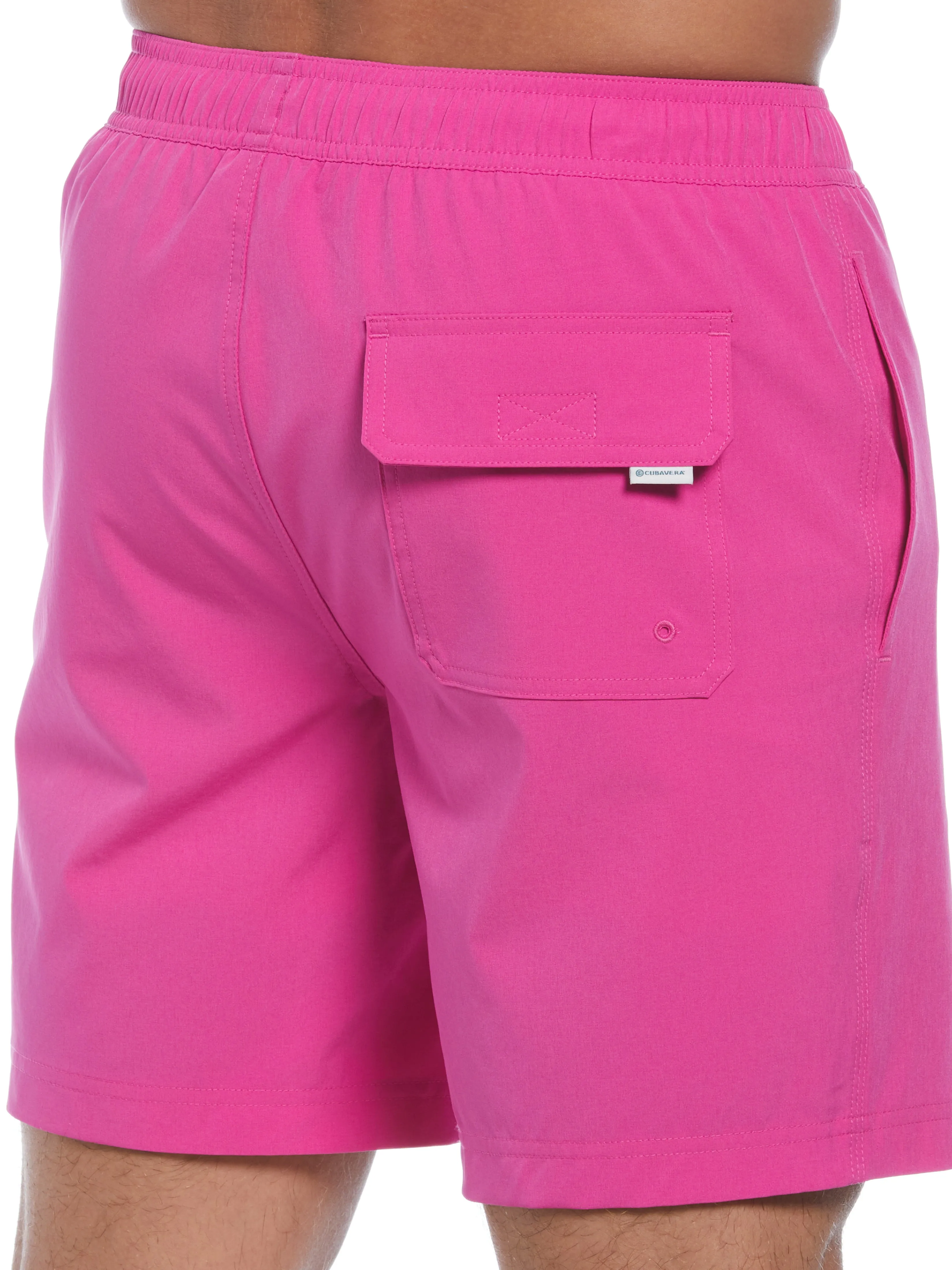 Solid 7" Swim Short sold by Perry Ellis