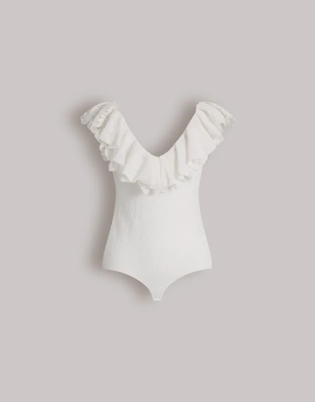 Body in pizzo di lana con maniche con volant made by Alberta Ferretti