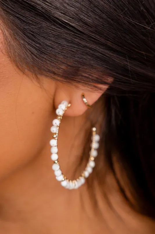 Light Cream Beaded Hoops sold by Pink Lily
