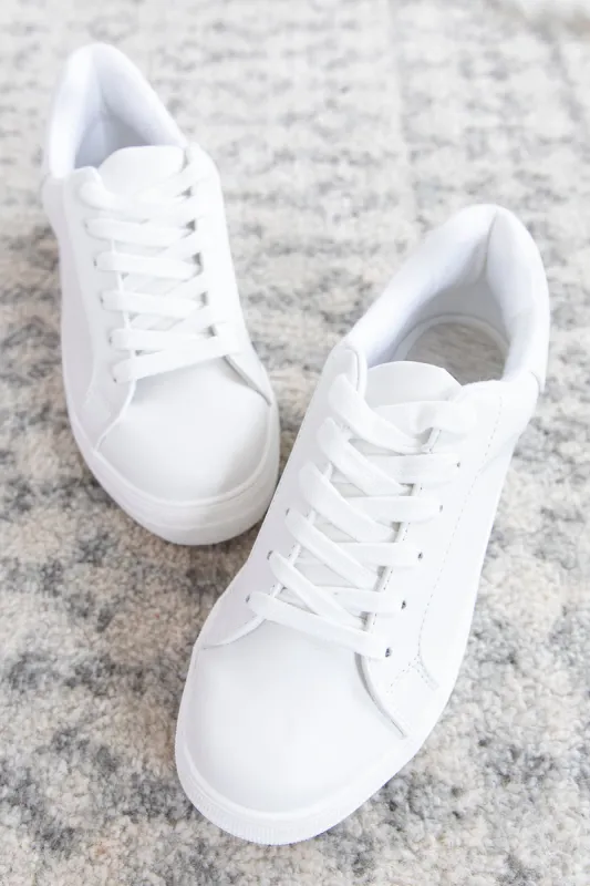 The Jenny White Solid Sneakers sold by Pink Lily