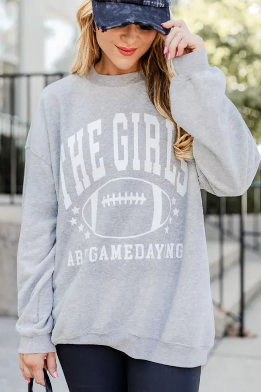 The Girls are Gamedaying Grey Oversized Graphic Sweatshirt sold by Pink Lily