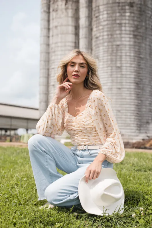 Show Me The Way Tan Ruched Balloon Sleeve Floral Bodysuit sold by Pink Lily