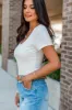 Not Your Average Ivory Scoop Neck Ribbed Bodysuit SALE sold by Pink Lily