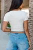 Not Your Average Ivory Scoop Neck Ribbed Bodysuit SALE sold by Pink Lily