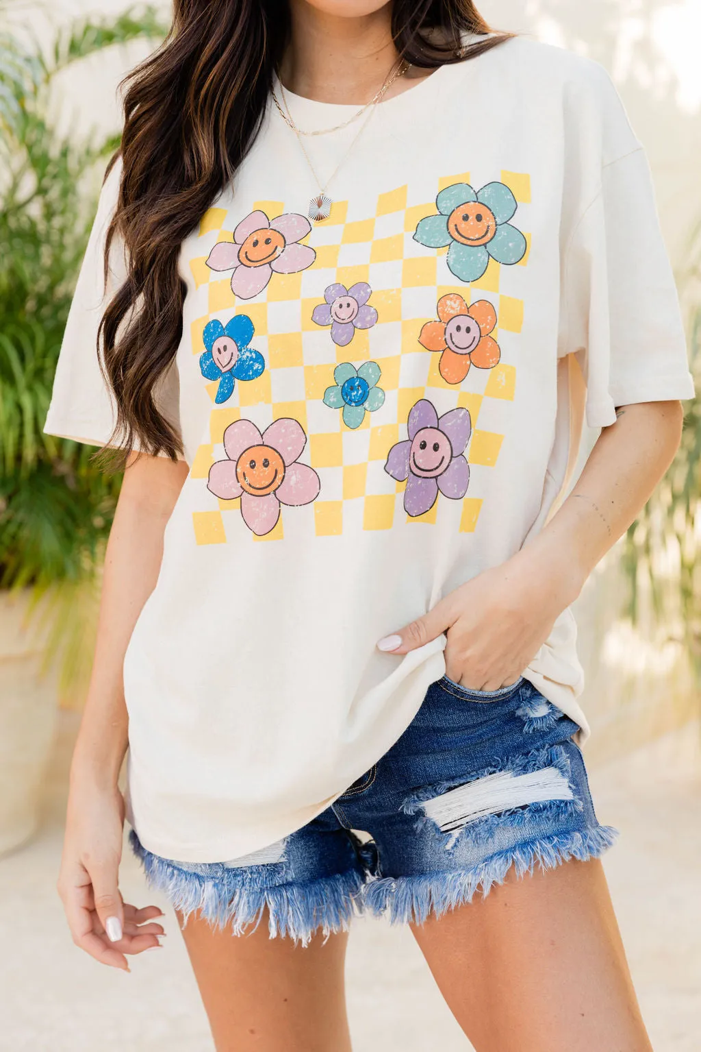 Daisy Checkered Ivory Oversized Graphic Tee sold by Pink Lily