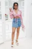 With A Twist Medium Acid Wash Denim Skort FINAL SALE sold by Pink Lily