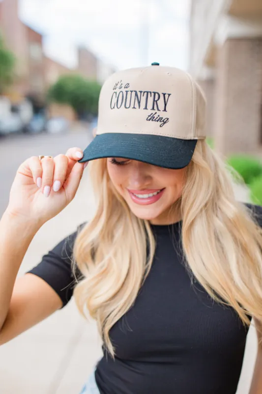 It’s A Country Thing Black and Khaki Trucker Hat sold by Pink Lily