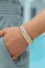 Gold Stretch Bangle sold by Pink Lily