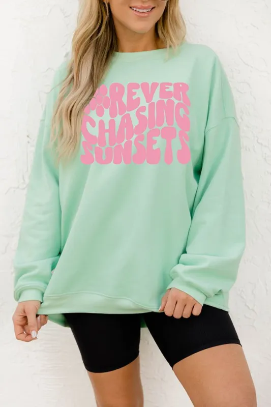 Forever Chasing Sunsets Oversized Lime Graphic Sweatshirt sold by Pink Lily