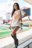 Raised On Dolly And Football Soft Cream Oversized Graphic Tee sold by Pink Lily