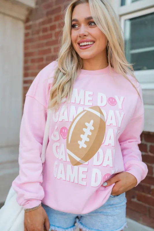 Gameday Smiley Light Pink Oversized Graphic Sweatshirt sold by Pink Lily
