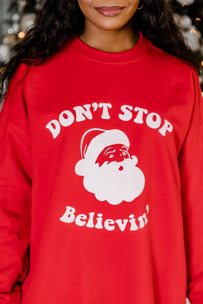 Don’t Stop Believin' Red Oversized Graphic Sweatshirt sold by Pink Lily product image thumbnail 3