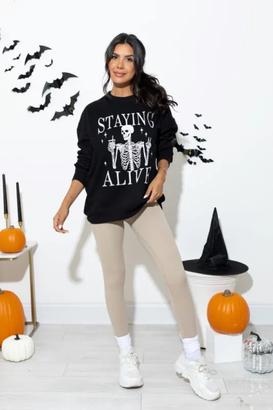 Staying Alive Black Oversized Graphic Sweatshirt sold by Pink Lily
