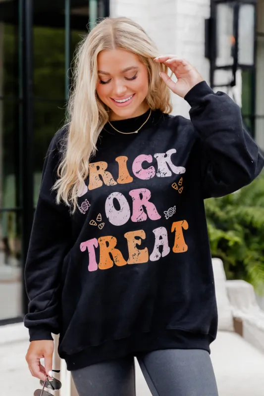 Trick or Treat Black Oversized Graphic Sweatshirt sold by Pink Lily