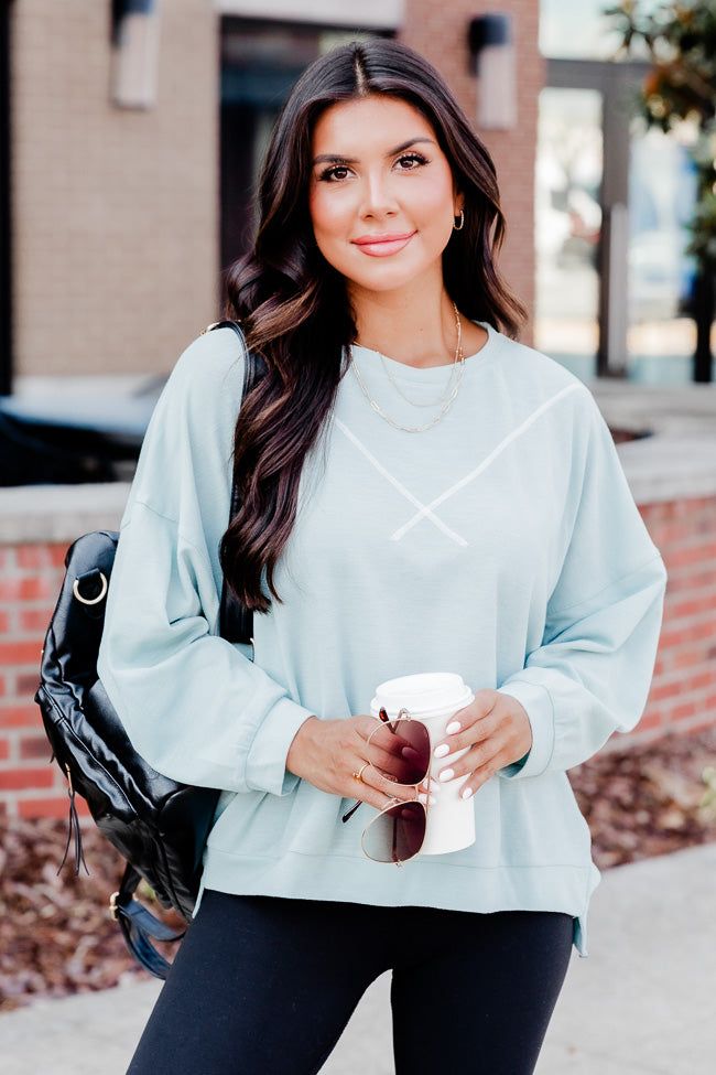 Making My Move Mint Exposed Seam Pullover sold by Pink Lily