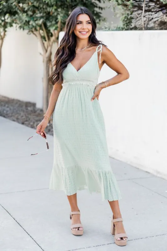 In The Wind Sage V-Neck Maxi Dress sold by Pink Lily