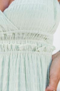 In The Wind Sage V-Neck Maxi Dress sold by Pink Lily
