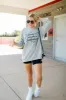 Stadium Snacks And Quarterbacks Light Grey Oversized Graphic Sweatshirt SALE sold by Pink Lily