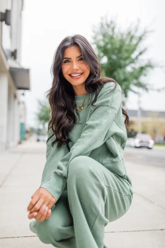 Learn As You Go Olive Acid Washed Crew Neck Pullover sold by Pink Lily