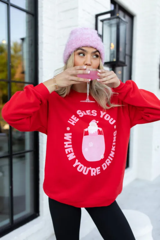 He Sees You When You're Drinking Red Oversized Graphic Sweatshirt sold by Pink Lily