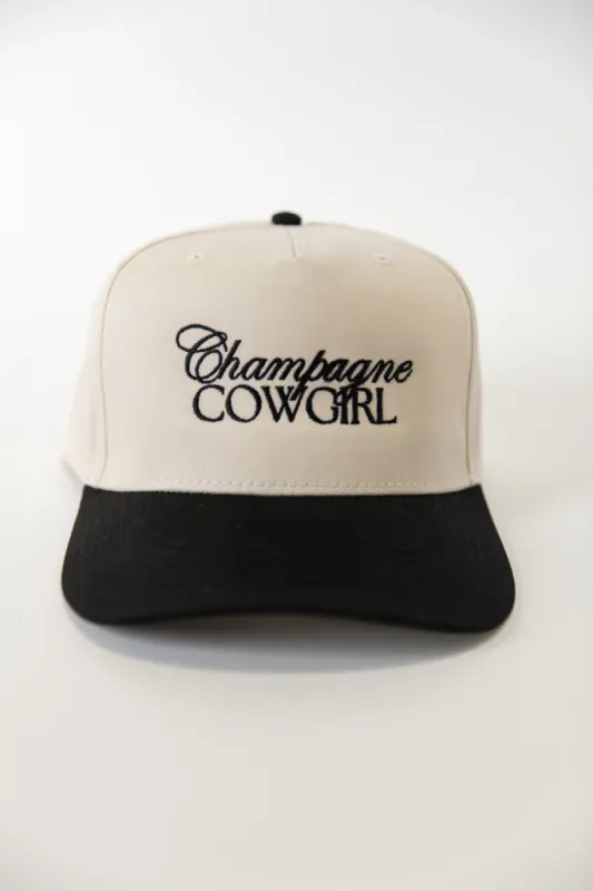 Champagne Cowgirl Black and Natural Trucker Hat sold by Pink Lily