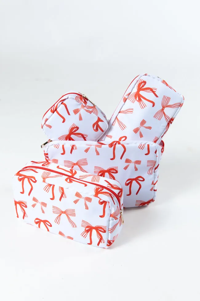 Red Bows 4 Piece Cosmetic Bags Set sold by Pink Lily