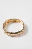 Gold Stretch Bracelet with Multi Rhinestone and Pearl Studded Accents sold by Pink Lily