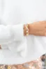 Gold Stretch Bracelet with Multi Rhinestone and Pearl Studded Accents sold by Pink Lily