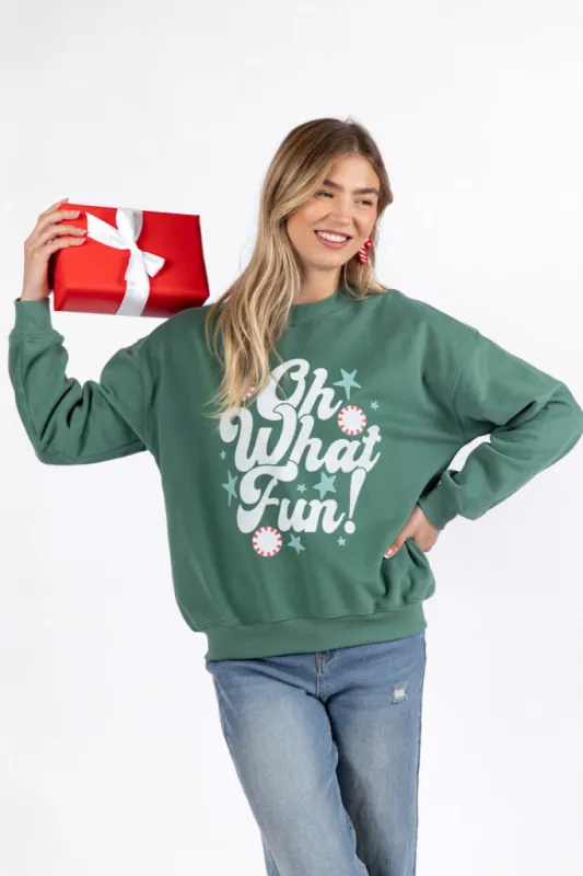 Oh What Fun Pine Needle Green Graphic Sweatshirt DOORBUSTER sold by Pink Lily