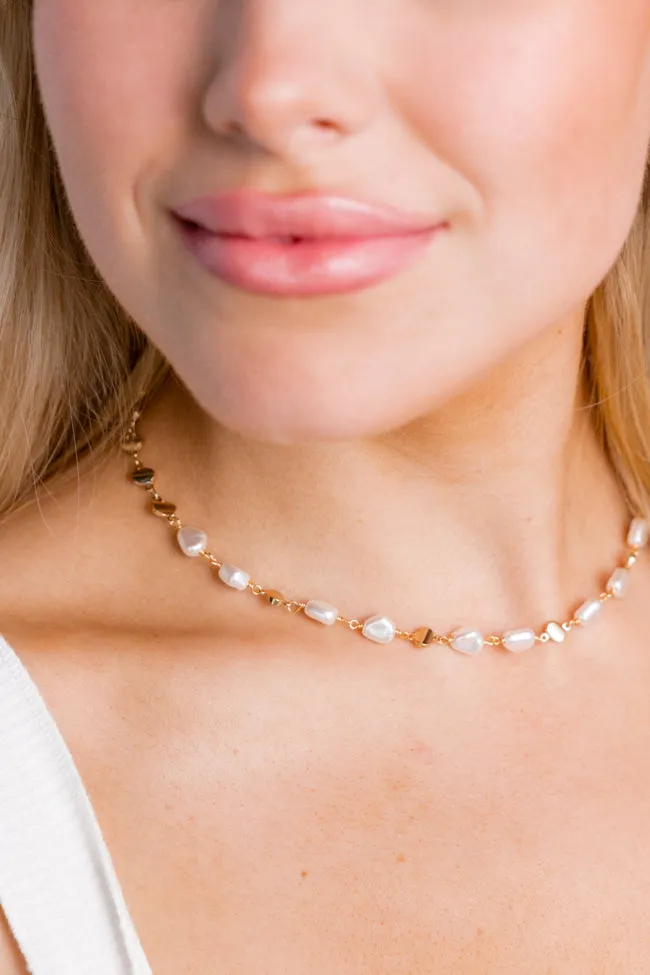 Gold and Pearl Necklace sold by Pink Lily