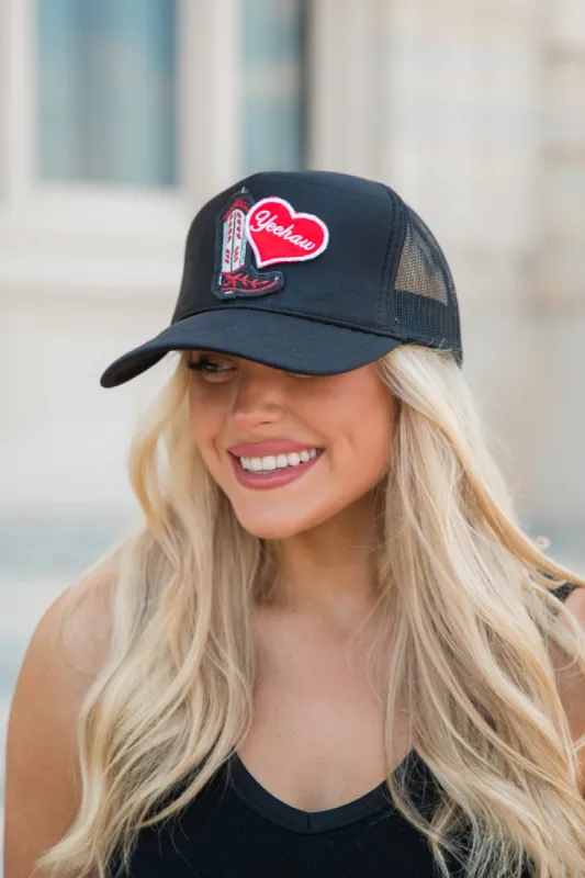 Yeehaw Multi Patch Black Trucker Hat sold by Pink Lily