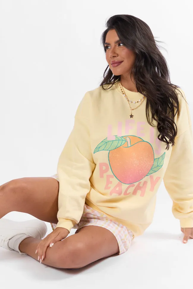 Life is Peachy Light Yellow Graphic Sweatshirt sold by Pink Lily