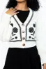 Bloom With Grace Ivory and Black Floral Embroidered Cardigan SALE sold by Pink Lily
