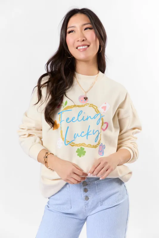 Feeling Lucky Sweet Cream Graphic Sweatshirt sold by Pink Lily