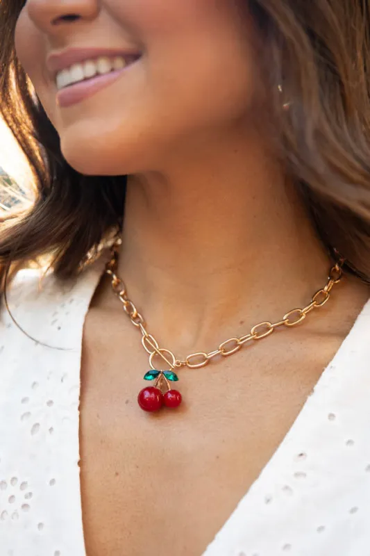 Gold Cherry Charm Necklace sold by Pink Lily