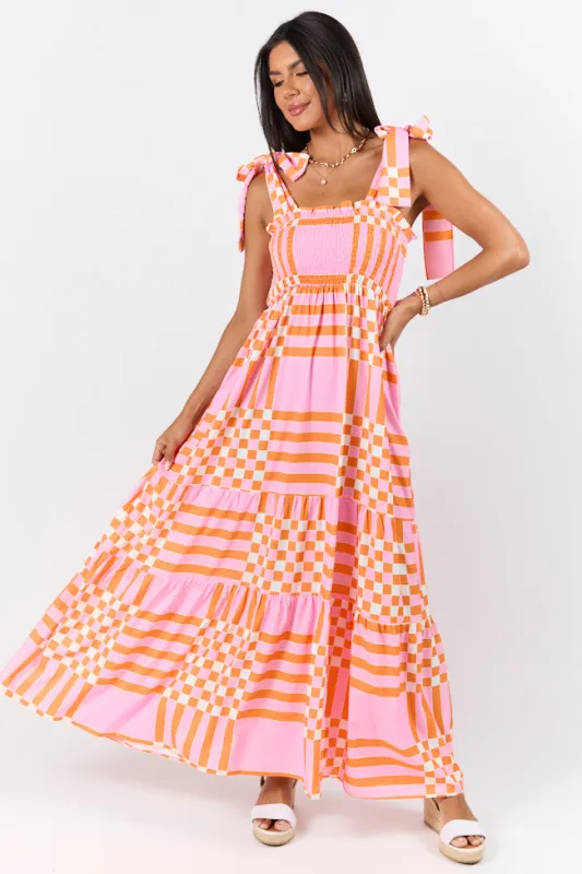 Get The Check Pink and Orange Printed Checkered Midi Dress sold by Pink Lily