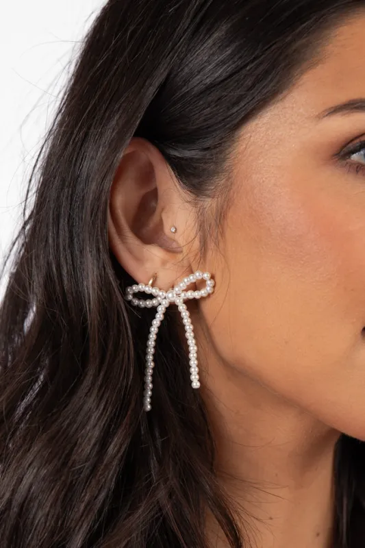 Pearl Bow Earrings sold by Pink Lily